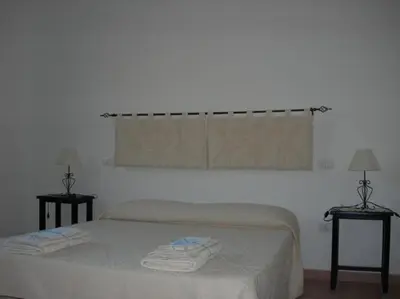Letto o letti in una camera di Agriturismo Sannoranna
