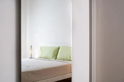 Letto o letti in una camera di L'isola che c'è - Appartamento