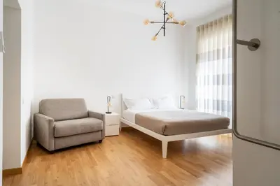 Letto o letti in una camera di L'isola che c'è - Appartamento