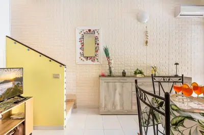 Cucina o angolo cottura di GuestHost - La Collina Villasimius - Yellow Apartment!