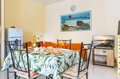 Cucina o angolo cottura di GuestHost - La Collina Villasimius - Yellow Apartment!