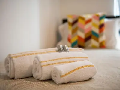 Letto o letti in una camera di Il Giardino Apartment- Between Beach and City Center Cagliari
