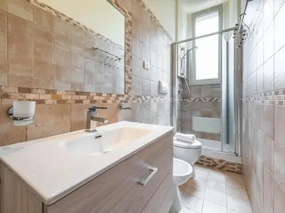 Bagno di Il Giardino Apartment- Between Beach and City Center Cagliari