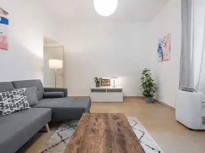 Area soggiorno di Il Giardino Apartment- Between Beach and City Center Cagliari