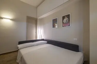 Letto o letti in una camera di Janas Best Suites by Propertize