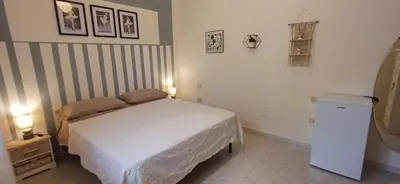 Letto o letti in una camera di Sardinia Del Sud