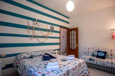Letto o letti in una camera di Sardinia Del Sud