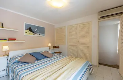 Letto o letti in una camera di Villa Buganvillea near the beach