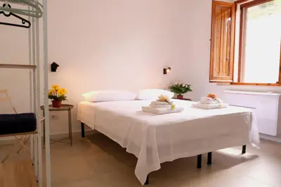 Letto o letti in una camera di Sunset Beach House Buggerru