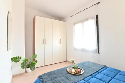 Letto o letti in una camera di IzzHome Escape 1