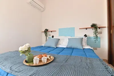 Letto o letti in una camera di IzzHome Escape 1