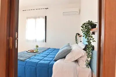 Letto o letti in una camera di IzzHome Escape 1
