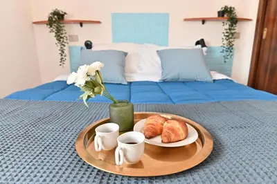 Letto o letti in una camera di IzzHome Escape 1