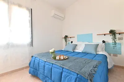 Letto o letti in una camera di IzzHome Escape 1
