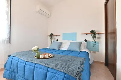 Letto o letti in una camera di IzzHome Escape 1