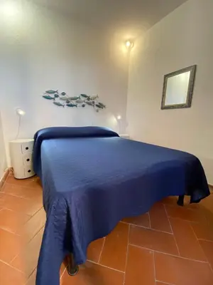 Letto o letti in una camera di Villa Taconta Tartariga