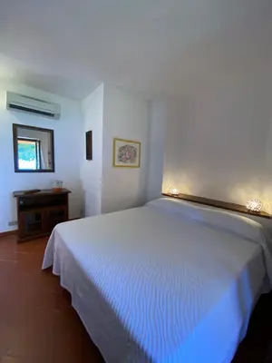 Letto o letti in una camera di Villa Taconta Tartariga