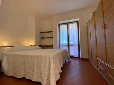 Letto o letti in una camera di Villa Taconta Tartariga