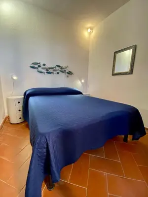 Letto o letti in una camera di Villa Taconta Tartariga