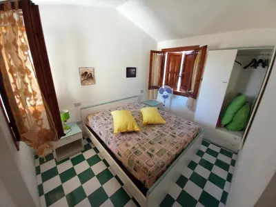 Letto o letti in una camera di Casa Maci