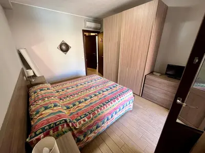 Letto o letti in una camera di Casa Alessandro By La Via Del Mare Viaggi e Vacanze
