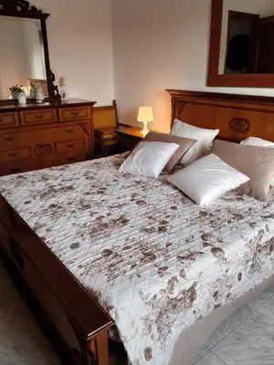 Letto o letti in una camera di Casa Erminia