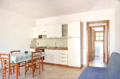 Cucina o angolo cottura di Le Peonie 1 - appartamento mare Sardegna