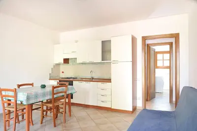 Cucina o angolo cottura di Le Peonie 1 - appartamento mare Sardegna