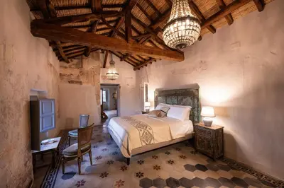 Letto o letti in una camera di Palazzo Boyl 1840