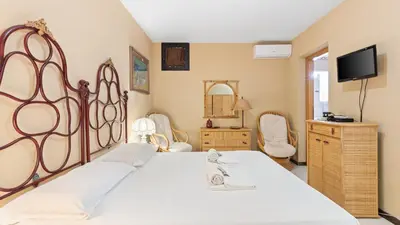 Letto o letti in una camera di Luxury Villa Maestrale- San Giovanni di Sinis