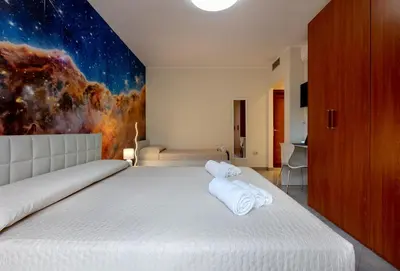 Letto o letti in una camera di Galaxy Room Sardinia