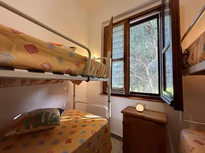 Letto o letti in una camera di casa Sa Breca