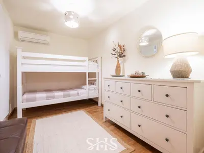 Letto o letti in una camera di Villa Emilia