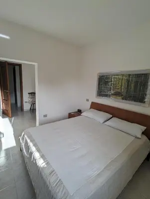 Letto o letti in una camera di Villa del Capitano