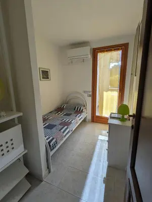 Letto o letti in una camera di Villa del Capitano