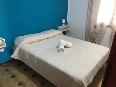 Letto o letti in una camera di Villa 
