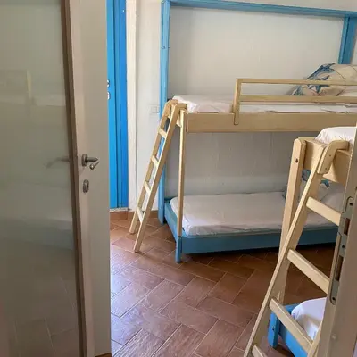 Letto o letti in una camera di La casa del mandorlo