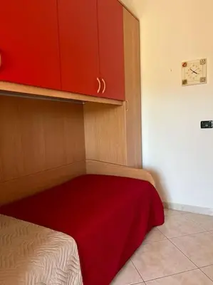 Letto o letti in una camera di Casa Sole Piscinas
