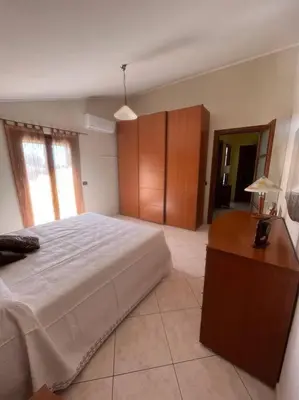 Letto o letti in una camera di Casa Sole Piscinas