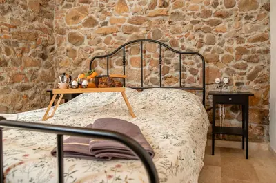 Letto o letti in una camera di Casa Feraxi at Casa Sardinia