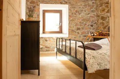 Letto o letti in una camera di Casa Feraxi at Casa Sardinia