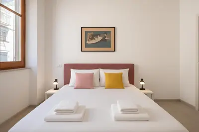 Letto o letti in una camera di Casa Ofride -Centro-Poetto 10 min-Wi-Fi-Netflix