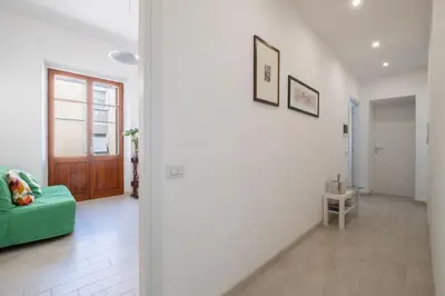 Area soggiorno di Casa Ofride -Centro-Poetto 10 min-Wi-Fi-Netflix
