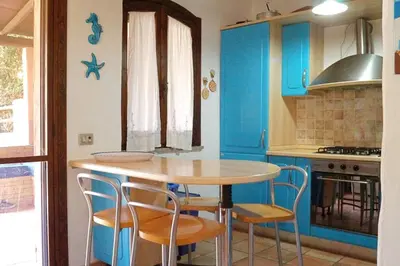 Cucina o angolo cottura di Villa Caposchiera Indipendente