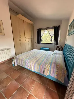 Letto o letti in una camera di Villa Caposchiera Indipendente