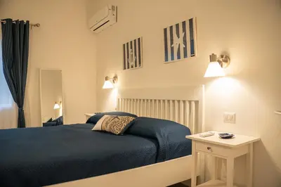 Letto o letti in una camera di Villa Linda