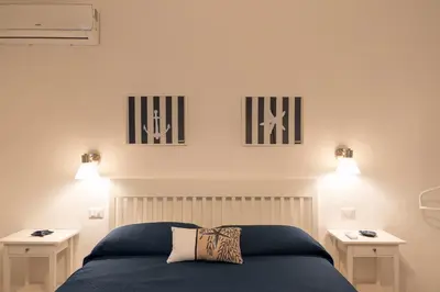 Letto o letti in una camera di Villa Linda