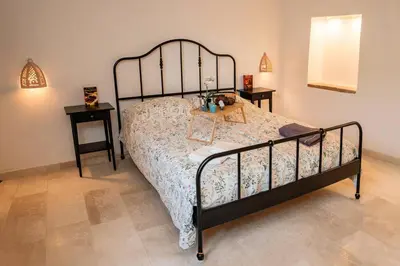 Letto o letti in una camera di Casa Sardinia