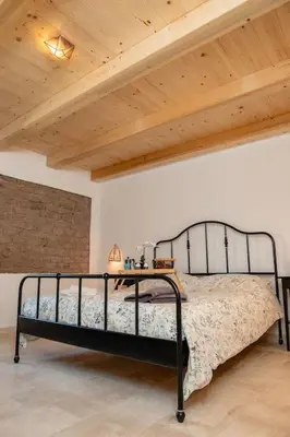 Letto o letti in una camera di Casa Sardinia