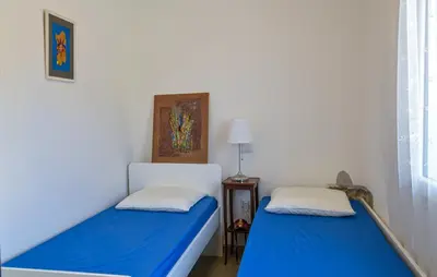 Letto o letti in una camera di Casa Gianni